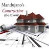 MANDUJANO'S Construction logo