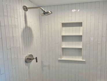 Photos by Lightship Development LLC #1 Complete remodel due to flood. Reconfigured master bathroom floor plan to accommodate over sized walk in shower.