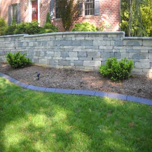 Hanover area we installed curbing around a retaining wall
