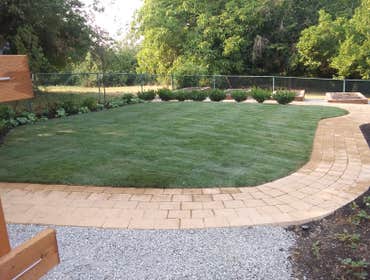 Photos by Rc Healthy Lawns #1 Full yard restoration pavers, retaining walls, vegetable gardens, flower beds, sod, shrugs ,plants and trees.