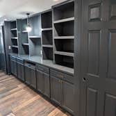 Spray Finished Built-in Office Bookshelf and Cabinets in Benjamin Moore Narragansett Green by Wescott Painting in Pittsburgh, PA. 1 of 3.