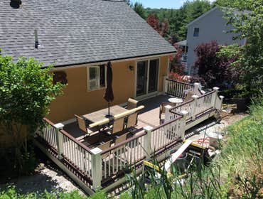 Peabody Deck Azek Silver Oak deck with Kona accent decking and rails.
