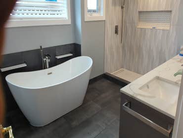 Photos by Construction & More #1 full master bathroom