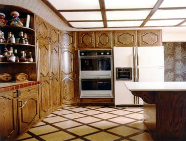 1982: Curved Classic Kitchen Remodel This kitchen had an almost perfectly square footprint. To make it more visually appealing we made heavy use of cur
