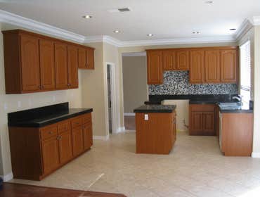 Monrovia kitchen cabinet reface This is a beautiful cabinet refacing job done in classic cherry color with with stylish arched upper doors (AL757) and 