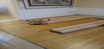 Photos by C&g Hardwood Flooring #2 Installed custom walnut border into existing red oak stained golden oak flooring in two rooms.