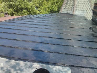 Photo(s) from Jays Roofing And Remodeling Metal seamed roof, destroyed from hail...
