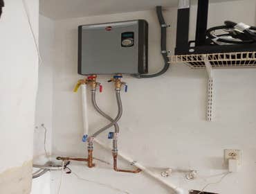 Tamar's New Tankless heater We replace the old Tank water heater with a brand New Tankless water heater so that Mr. Tamar could enjoy unlimited hot wat