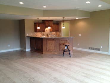 Large Basement A great basement finish we completed with built in bar and hidden pantry along with two bedrooms and fireplace.