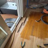 Photos by Floormasters & Design #1 Hardwood floor sanding and refinishing with some repairs.