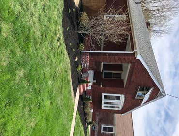 Photos by Steve Danylko Land Service #1 New lawn and landscaping