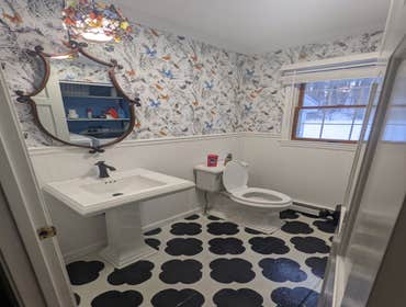 Lakeside Bathroom Welcome to our Lakeside Bathroom project, a remodel that combines bold design with elegant details. This space was reimagined with a 