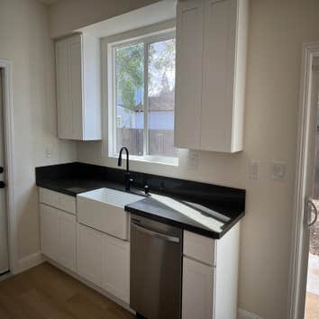 Photos by Casita Construction #1 1471 sq ft 2 story 3 bed 2.5 bath with 1 car garage, front porch, and solar