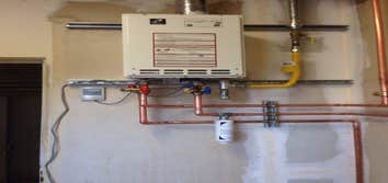 Indoor tankless water heater