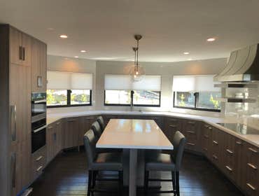 Photos by Scott Clower & Associates #1 Custom Kitchen remodel that required moving walls, new windows, installing a new 12' slider to take in the views