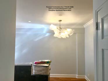 Alisha Apartment Renovation This beautiful home Renovated By the Puerwal Team! Involved an expression of simplicity and modern with crown moldings, sem
