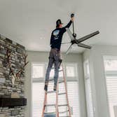 Master Electrician Thomas puts the finishing touches on a new ceiling fan install - No ceiling is too tall for us!