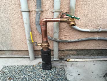 Oudoor water line and hose bib