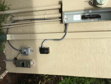 Photos by CER Electrical Services Inc of Florida #13 Portable generator legal safe interlock connection W/ 50FT cord & permit provided