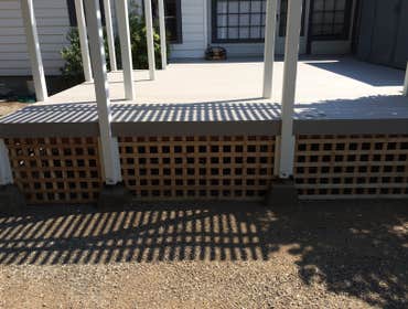 Deck & Trellis in South Salem This is a rebuild of a deck I did 25 years ago. The new composite decking replaced the old rotted painted wood deck.