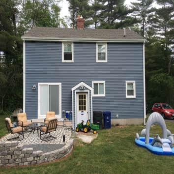 Vinyl Siding - Algonquin Way - E. Freetown Clapboard style vinyl siding in Harbor Blue with White trim and Black shutters.