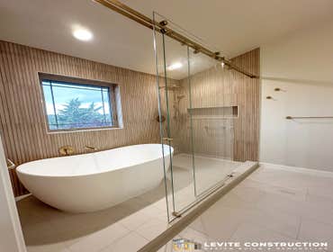 Beautiful Primary Bathroom Remodel by Levite Construction We are thrilled to share the final images of our latest project—an incredible transformation 