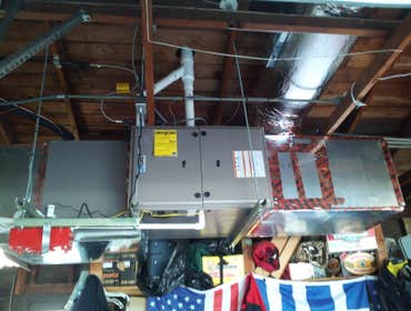 Eva M High efficiency, heating and a/c, hanging unit in garage