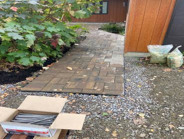 Photos by Steve Danylko Land Service #1 New lawn and landscaping