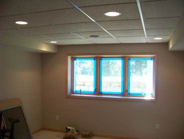 Finished Basement Finished a basement, framing, sheetrock, bathroom tile, bathroom vanity, ceiling tile, trim, doors and hardware.