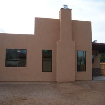 Custom House This a beutiful 1500 sq. ft.spec house we did. 3 bdrm, 2 bath, rounded walss, copper sinks, travertine flooring, granite countertops.
