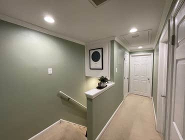 Recessed lights added to a dark hallway