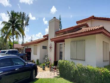 Photos by MGA Florida Construction,inc Shutters Installation