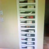 Renovation Berkeley Hills rental property Interior renovation in Berkeley Hills: the custom wine rack was once an ironing board cabinet.