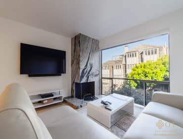 Photos by O.T Bay Builders-Condo Remodel Experience a warm and inviting space in this beautifully remodeled condo! ✨ With clean grey marble, white shak