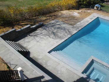 Patricks Pools Photos Patrick's Pools Inc is a swimming pool contractor serving Eastern Long Island. We specialize in elite gunite and vinyl pool insta
