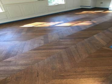 Custom Chevron Hardwood Flooring Design and Installation