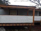 Front Porch Facelift Repair damaged areas from previously built deck, railings and stairs. Replaced wooden pickets with vynal lattice, built new woode