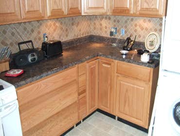 Kitchen Turned a kitchen in Carnegie from a very cold room to a room where true conversations can take place as well as preparing great food. There are