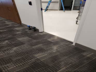Ala Moana - Spectrum Install Carpet Tiles front of House and VCT and Sheet Vinyl Back of House.