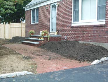 PLANTING WITH GARDEN WALL , STOOP AND WALKWAY