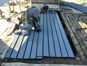 Photos by Bella Roofing #3 Dry cleaners roof repair Akron Ohio