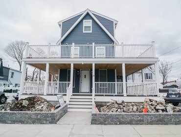 ROOM WITH A VIEW The transformation of this house is truly remarkable. Originally a 3-family home with two 1-bedroom apartments on the first floor and 