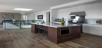Tiburon house Install hardwood flooring throughout house - wide plank white oak with cured urethane finish