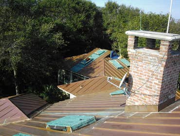 Applied Roofing Technology / Projects Copper Roofs, chimney caps & conductor head.