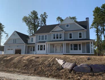 Photos by Journey Homes, LLC #2 Custom farmhouse built from clients plans using zip system, truss floors, zoned hvac, custom kitchen