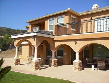Balcony, Open Porch by A. C. Framing and General Contractor, Inc. Built a restroom on the first floor for the pool area. Built a second floor balcony 