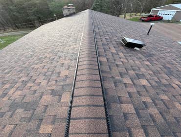 Photos by Altmire Roofing #1 Roofing, siding, and windows installations