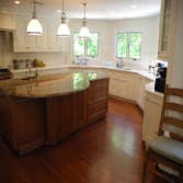 Kitchen Remodel; Central NJ A very large, High End Kitchen with mixed Cherry and White Cabinets. Granite center island and white Marble perimeter coun