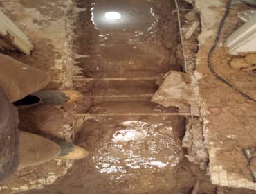 Remodeling Busted concrete in order to replace all cast iron sewer pipe which the bottom had rotten out. Replaced all pipe under slab for two one bath