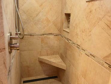 Custom transition-less shower - Seacliff Construction & Design Our client wanted a new shower that would be easy to maintain, private, and large enoug